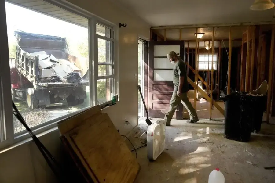 Flood-damaged house gutted to the studs after storm water came inside